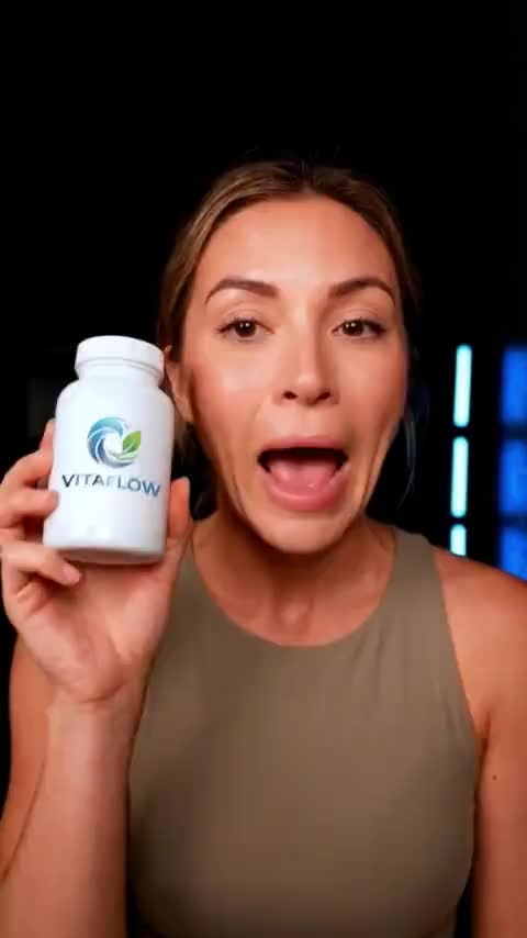 Generated product clip: a creator presenting a supplement bottle to camera in a dark studio
